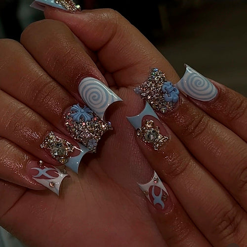 Artful nail art with cute animal motifs and glitter accents Bowlift