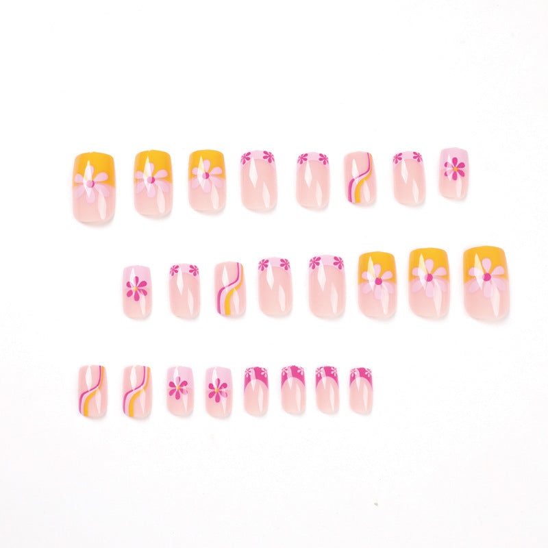 Creative Nail Art with Floral Design and Colorful Accents Bowlift