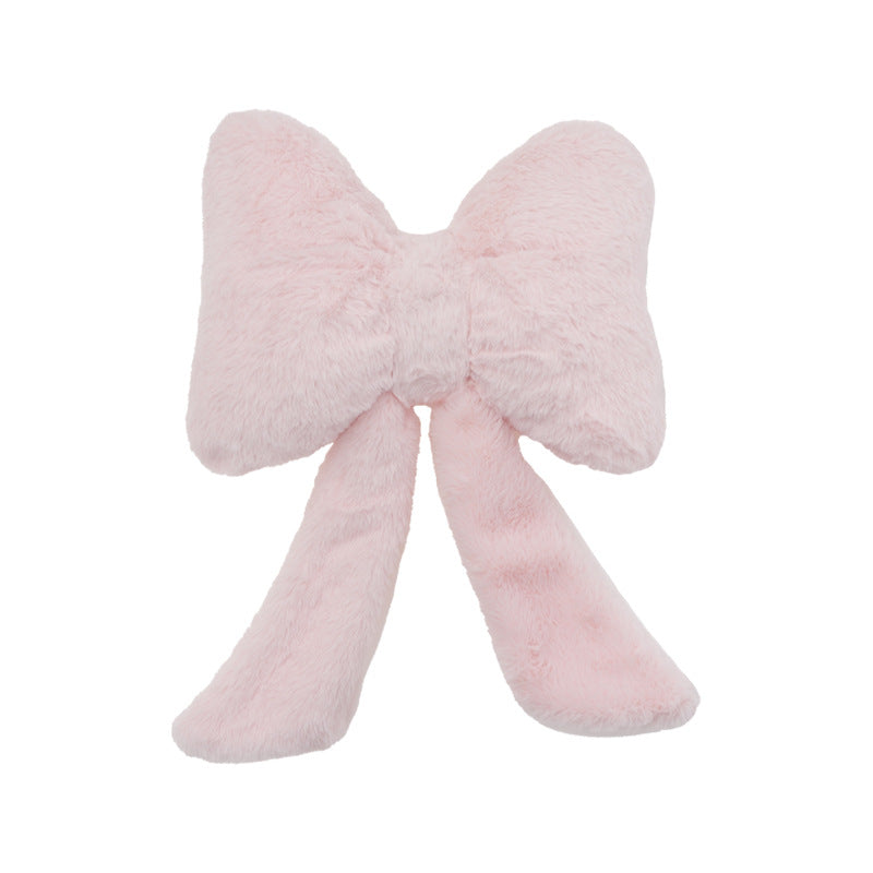 plush bow-shaped decorative throw cushion with long tails and faux-fur texture Bowlift