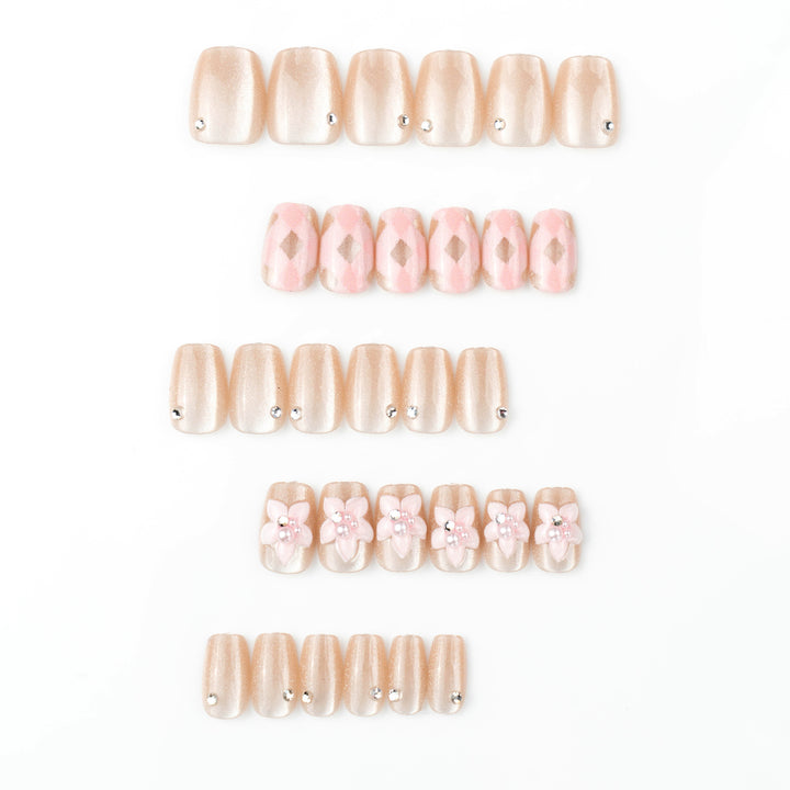 Artificial nail set with floral accents and glitter Bowlift