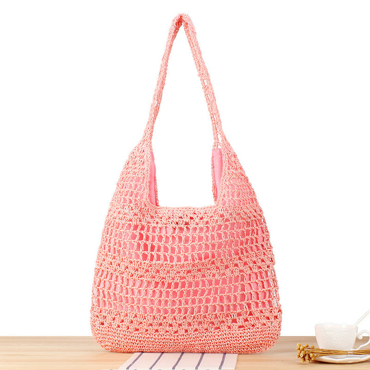 Handbag with floral appliqué Made of natural material Bowlift