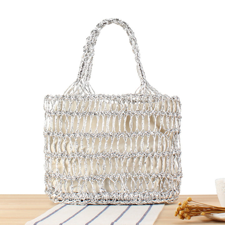 Shoulder bag made of punched metal grid Bowlift
