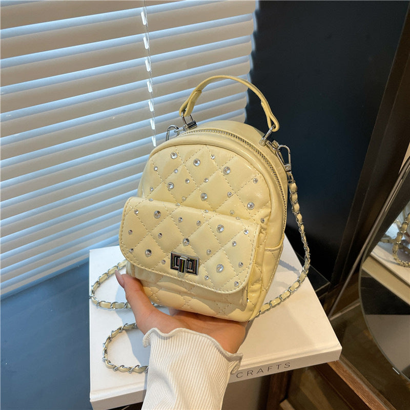 Quilted Mini Backpack with Rhinestone Accents Bowlift