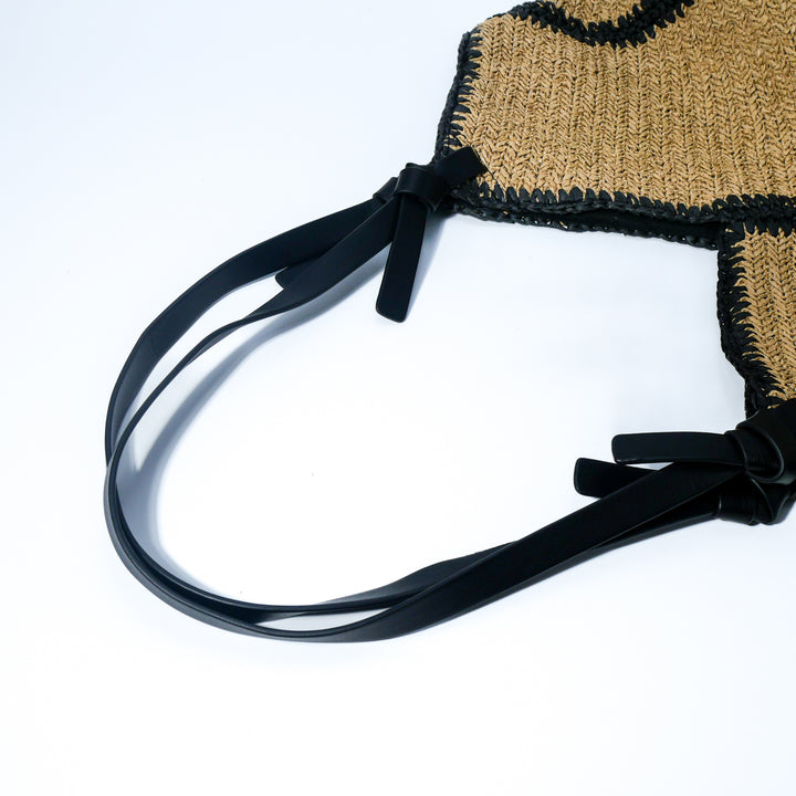 Fashionable beach bag made of woven natural material with leather handles Bowlift