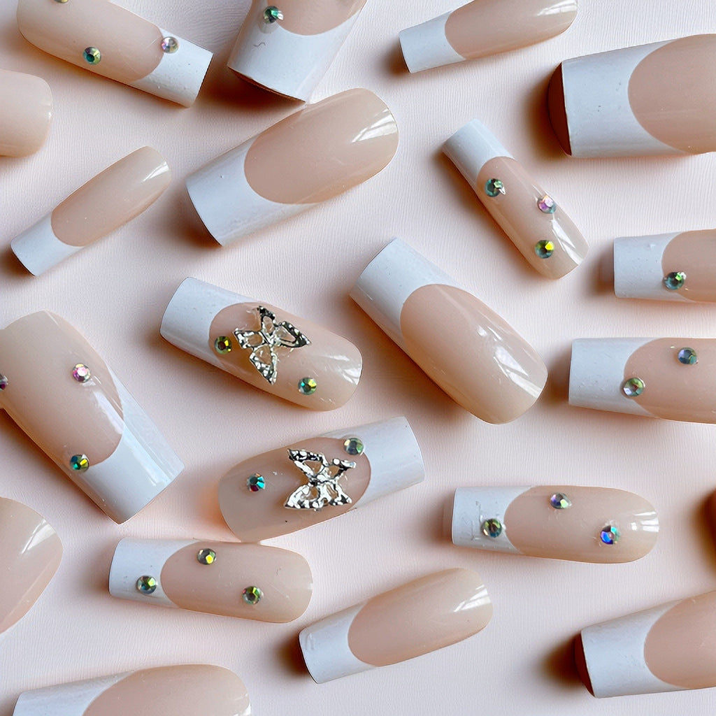 Elegant Stiletto Nail Extensions with Rhinestone Accents Bowlift
