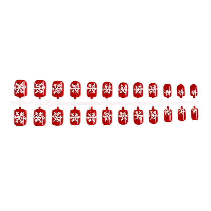 Artificial nail set with winter snowflake designs Bowlift