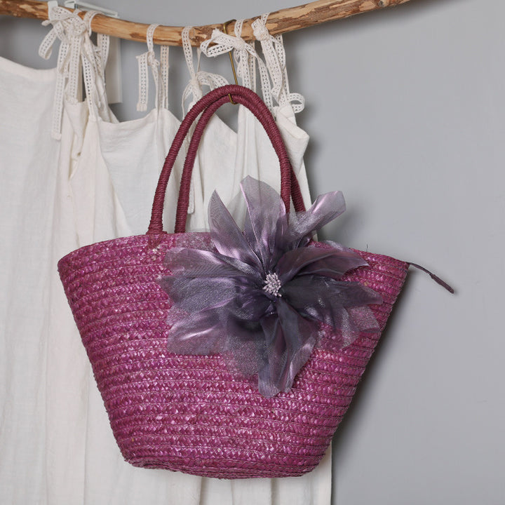 Stylish basket bag with eye-catching flower detail Bowlift