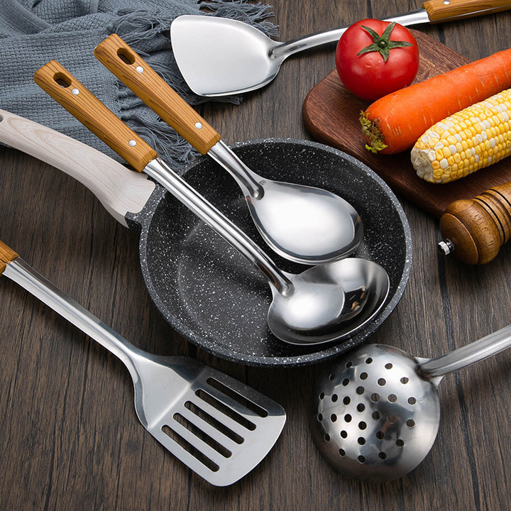 Slotted stainless steel turner spatula with ergonomic wooden handle Bowlift