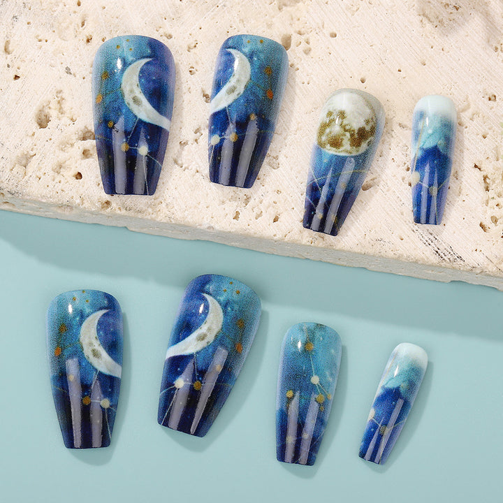 Dreamy artificial nails with moon and star design Bowlift