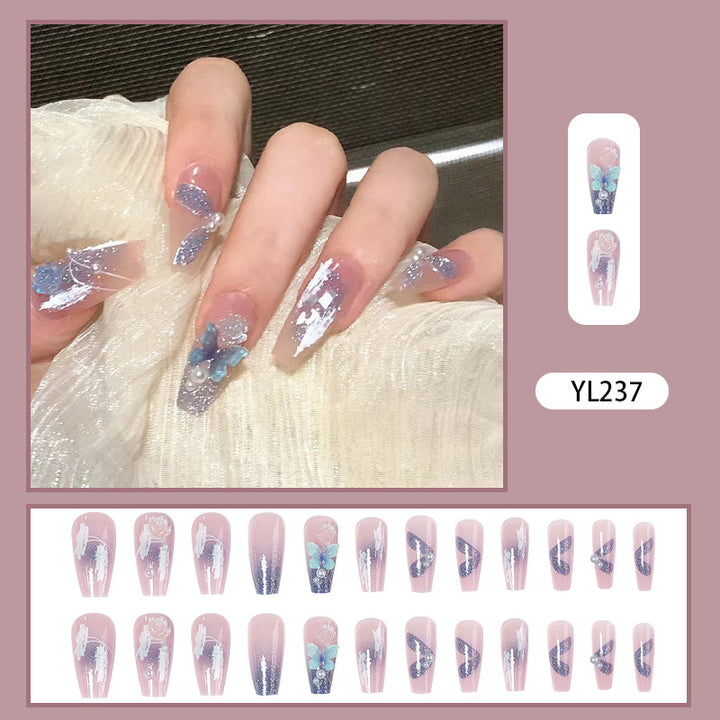 Artistic 3D nail extensions with glitter accents Bowlift