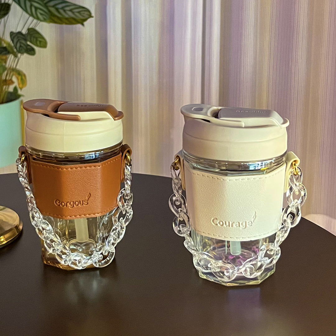 Women drinking cup with elegant leather handle and practical carrying chain Bowlift