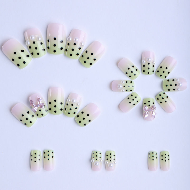Artificial nails with playful dots and 3D elements Bowlift