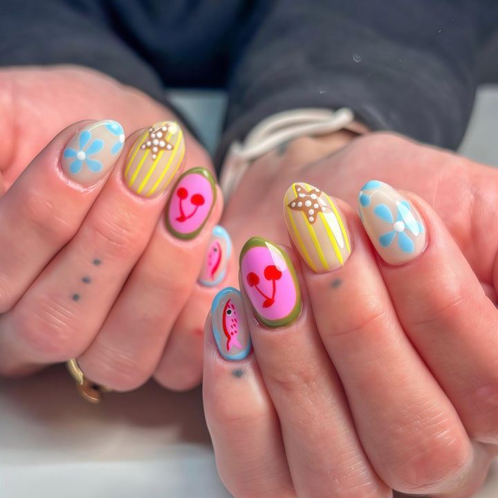 Creative Nail Art Set with Playful Designs Bowlift