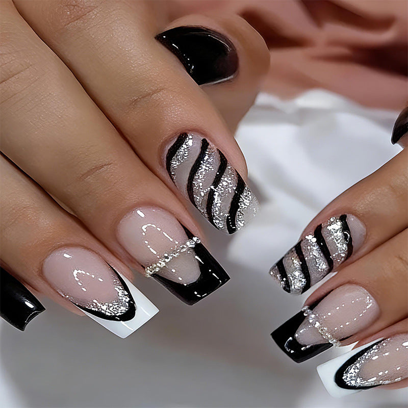 Artificial nail set with glamorous glitter and stripe designs Bowlift