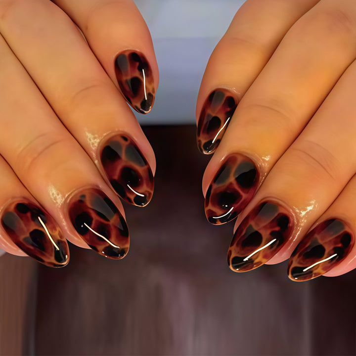 Glossy Stiletto Nail Tips with Leopard Print Design Bowlift