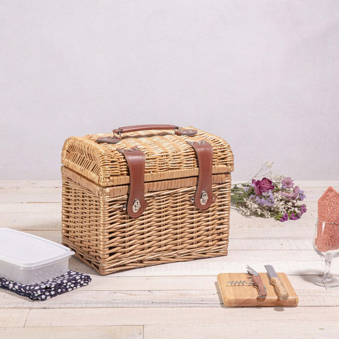 Ladies picnic basket with stylish glasses and wooden boards Bowlift