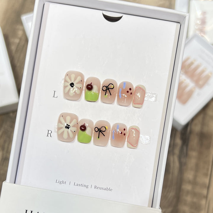 Artistic Floral Press-On Nail Set with Reusable Design Bowlift