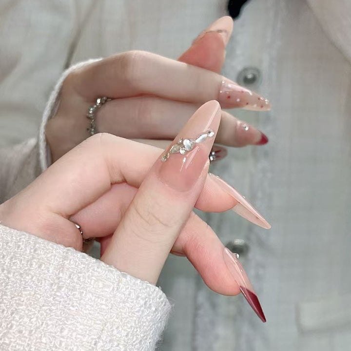 Artistic Press-On Nail Extensions with Decorative Patterns Bowlift