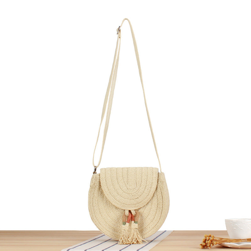 Round Bast Crossbody Bag with Tassels by Bowlift