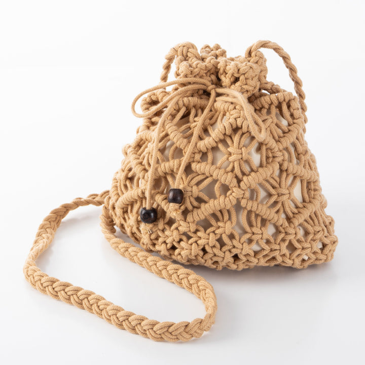 Handmade macrame shoulder bag with playful design Bowlift