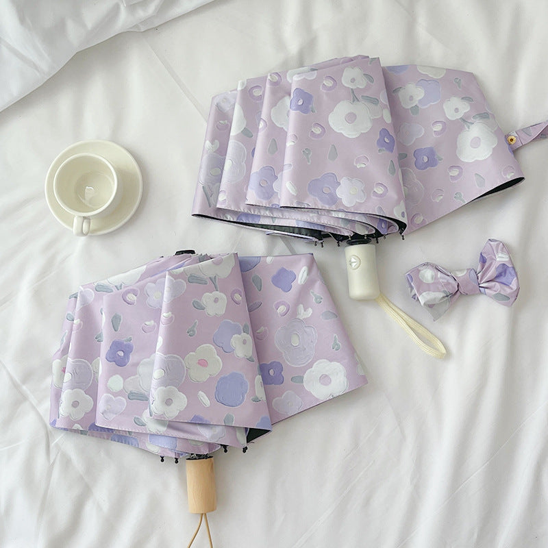 Women's Automatic Folding Umbrella with Floral Design and Practical Storage System Bowlift