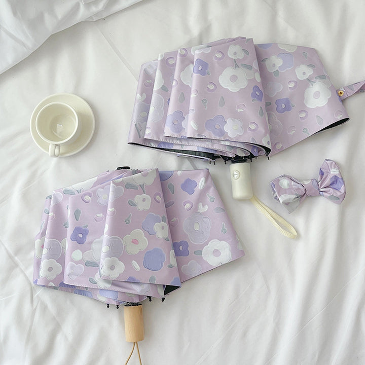 Women's Automatic Folding Umbrella with Floral Design and Practical Storage System Bowlift