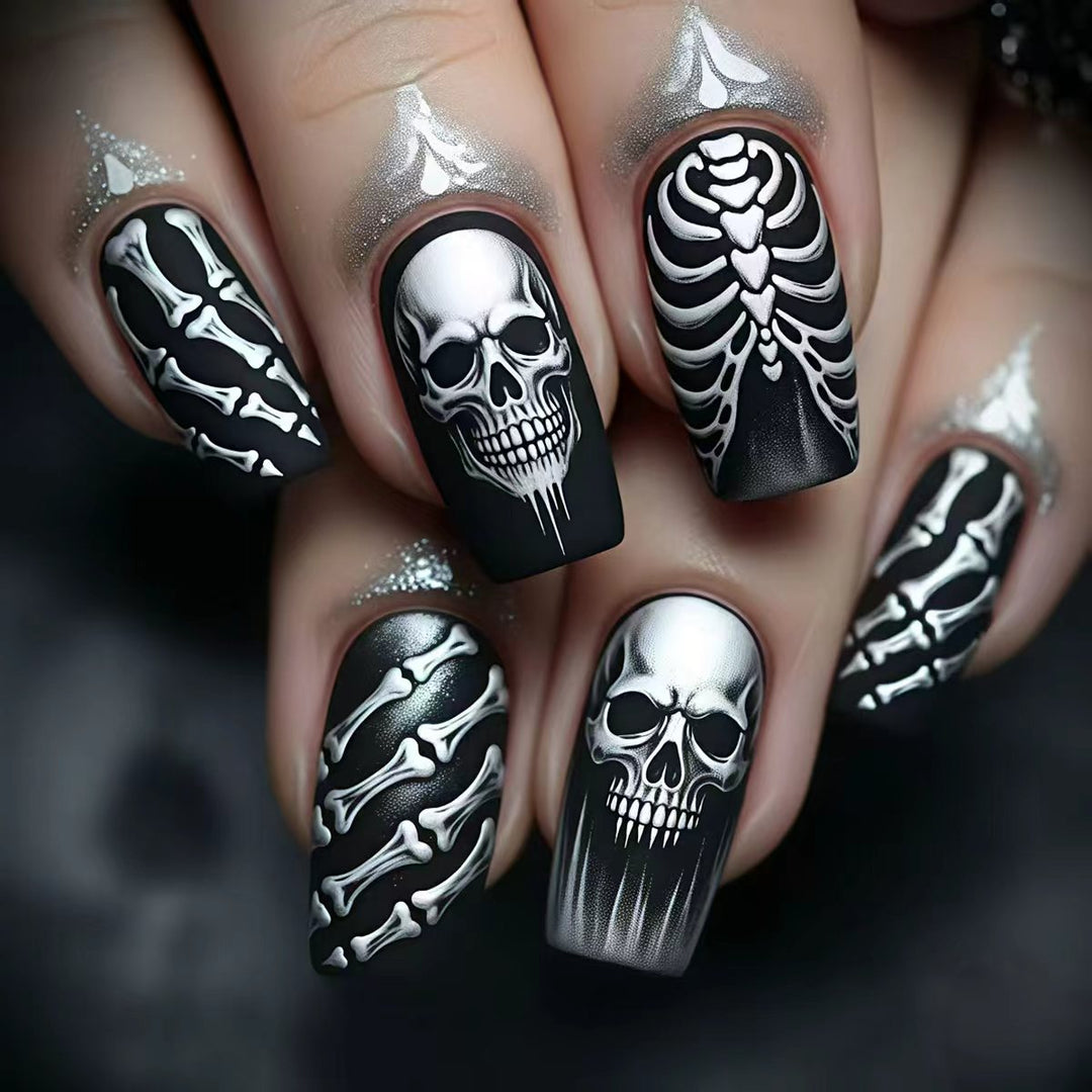 Creative artificial nails in spooky skull design Bowlift