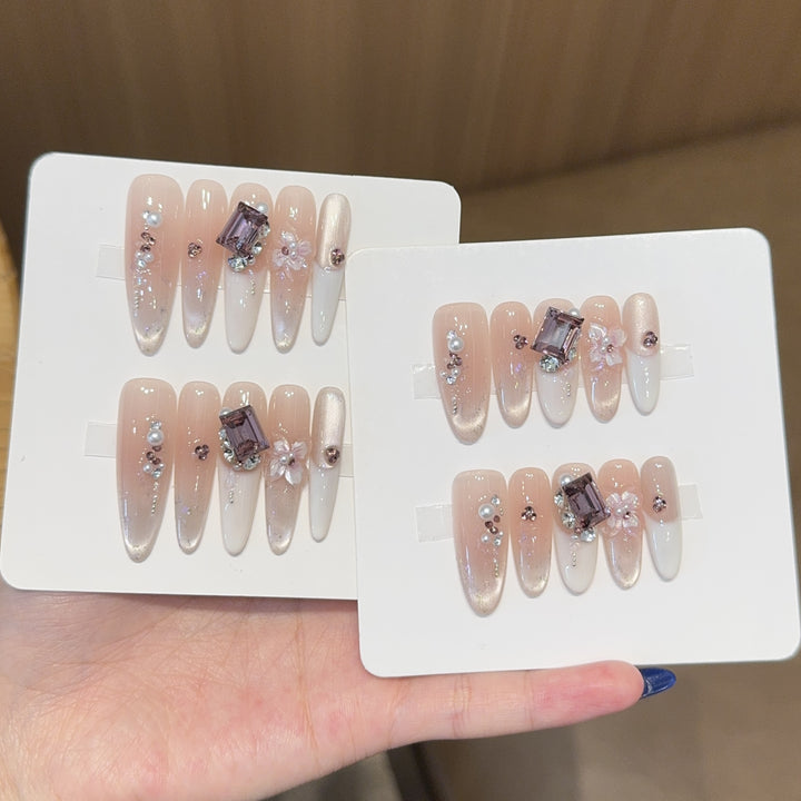 Artificial nails with elegant jewelry details Bowlift