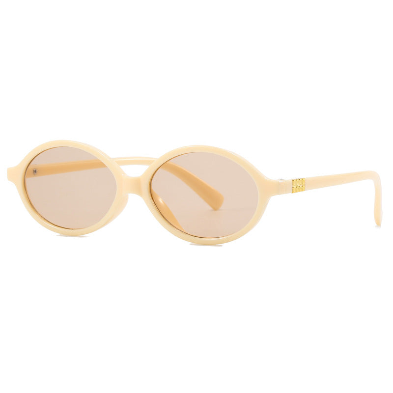 Women's fashionable sunglasses with oval frame and golden accents Bowlift