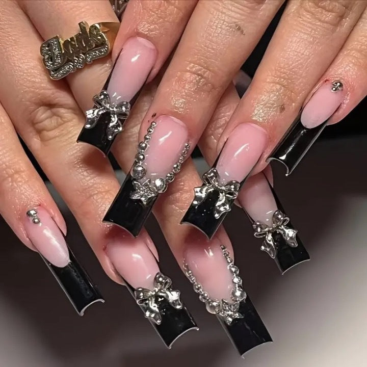 Artificial nail set with glamorous rhinestone accents and elegant 3D designs Bowlift