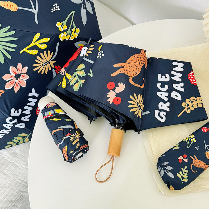 Women Folding Umbrella with Striking Flower Pattern Bowlift