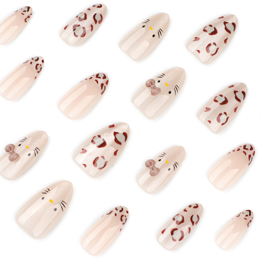 Creative Nail Art with Cute Cat Motif and Glitter Accents Bowlift