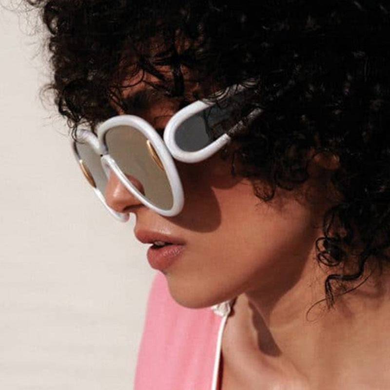 Women extravagant sunglasses in creative design Bowlift
