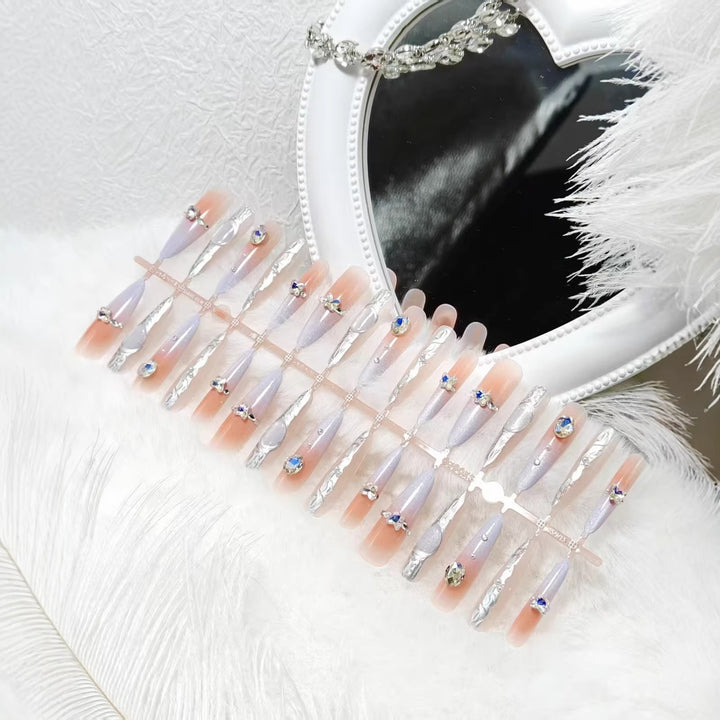 Artificial nails with elegant glitter and crystal accents Bowlift