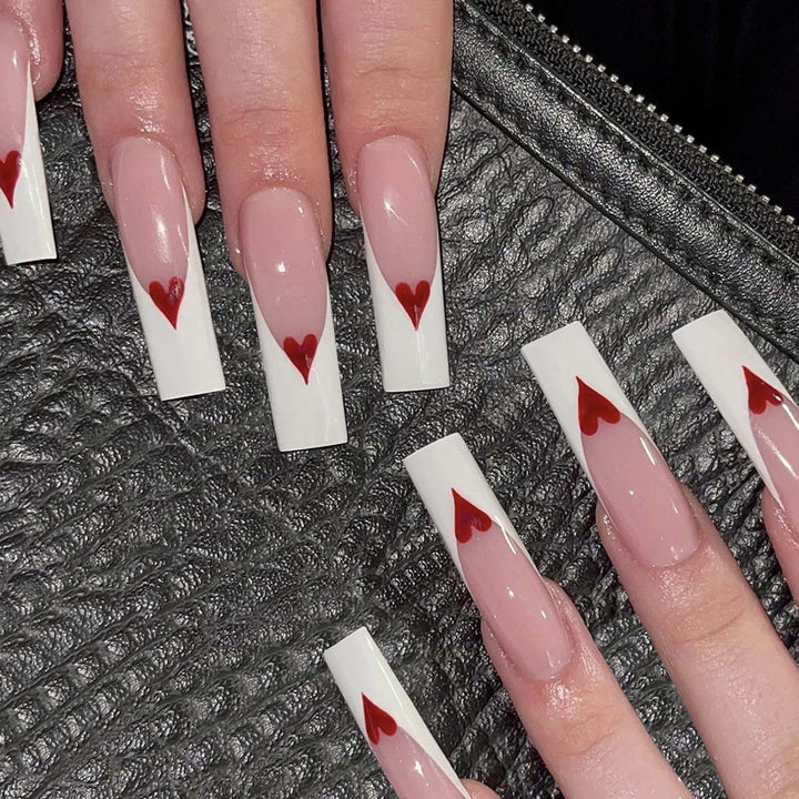 Artful nail extensions with heart design Bowlift