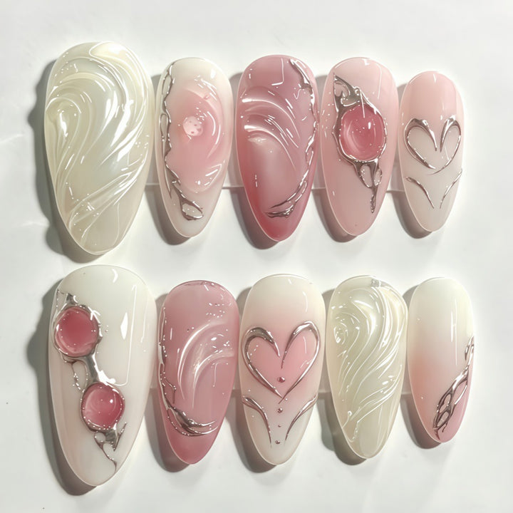 Elegant artificial nails with sophisticated heart and wave patterns Bowlift