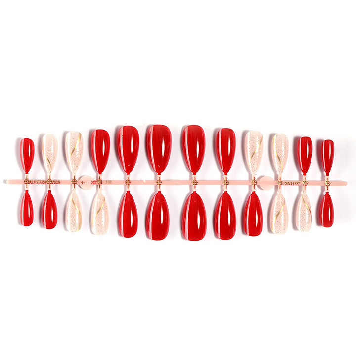 Artificial nail set with shiny red surface and stylish accents Bowlift