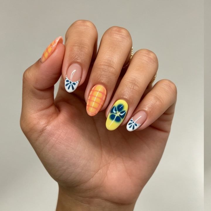 Artistic Press-On Nail Set with Floral and Geometric Designs Bowlift