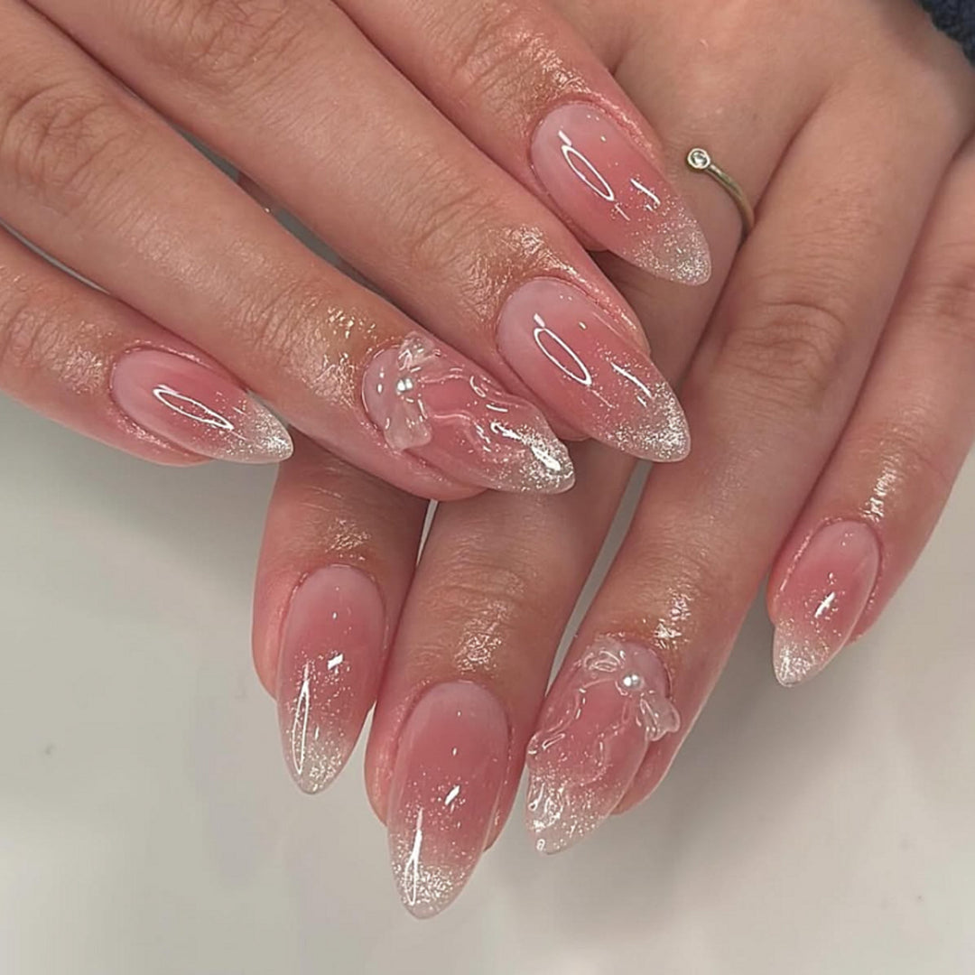 Elegant nail art in maritime design with glitter and 3D accents Bowlift
