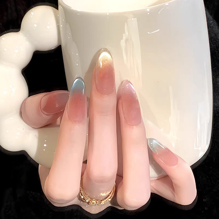 Artificial nails with elegant ombre effect and glitter accents Bowlift