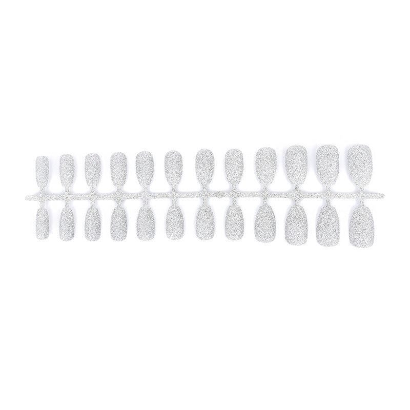 Glamorous artificial nails with sparkling glitter Bowlift