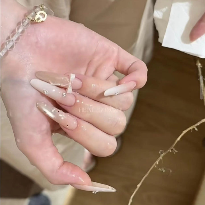 Long Stiletto Press-On Nails with Decorative Accents Bowlift