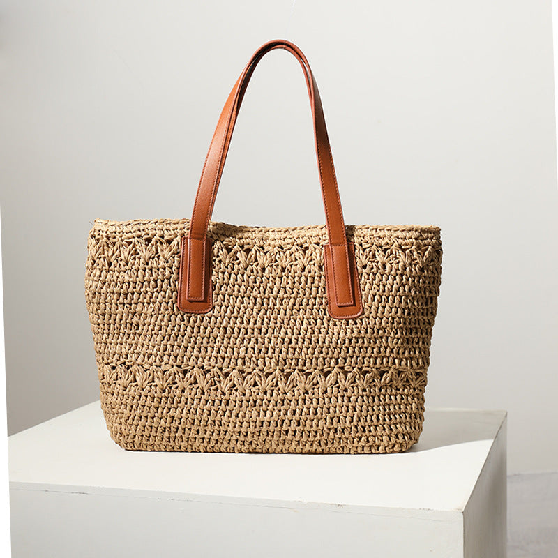 Braided straw bag with sturdy leather handles Bowlift