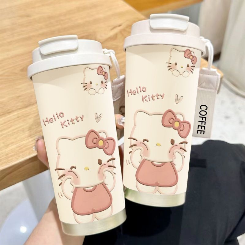 Women's insulated mug with practical carrying handle and charming Hello Kitty design Bowlift
