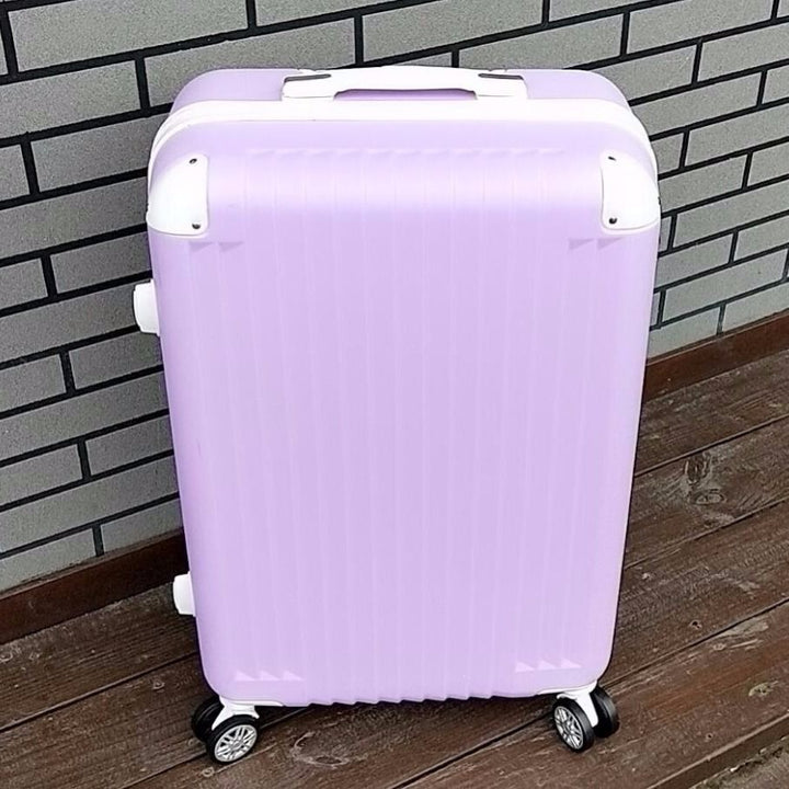 Hard-shell suitcase with quiet 360-degree wheels Bowlift