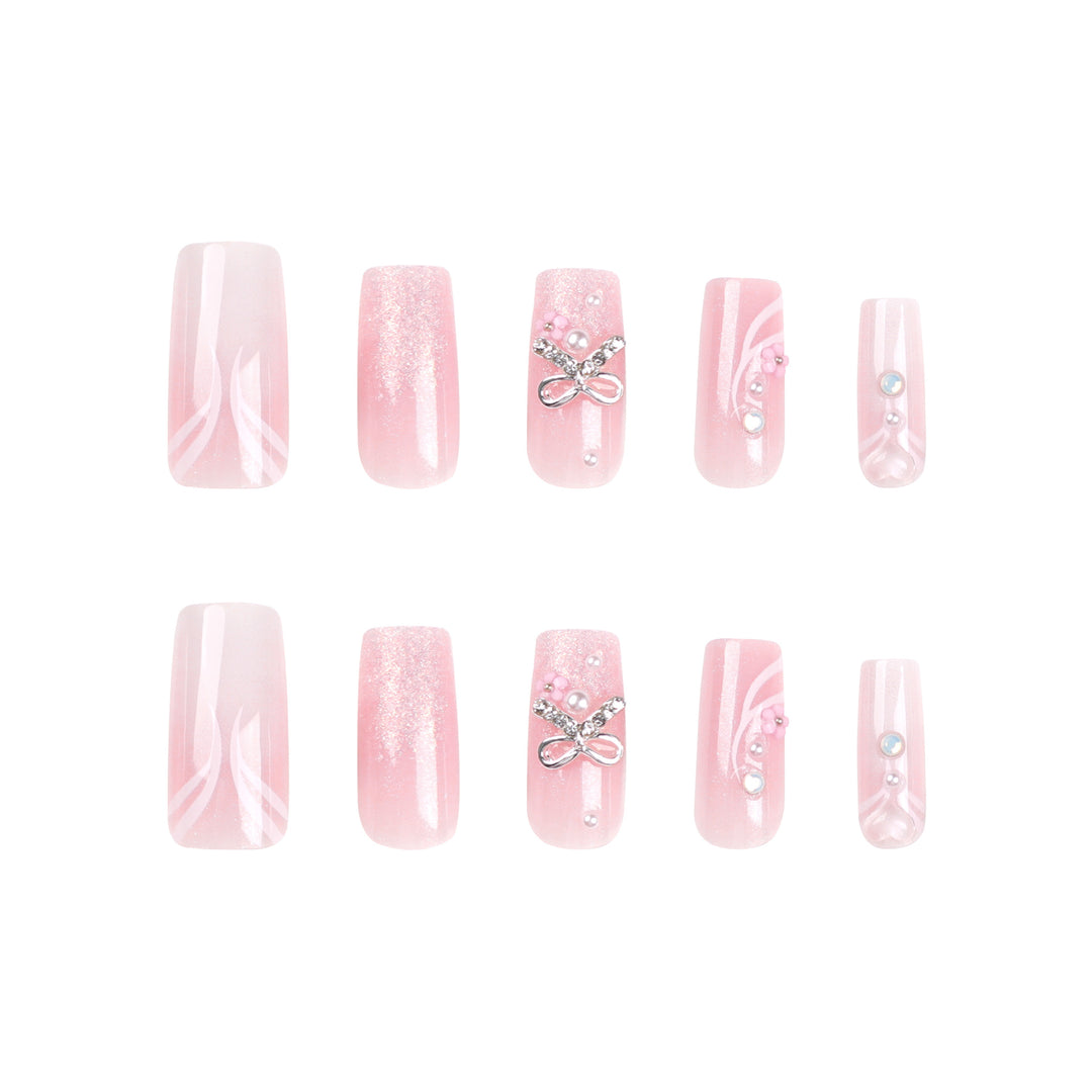 Artistic acrylic nails with elegant jewelry accents Bowlift