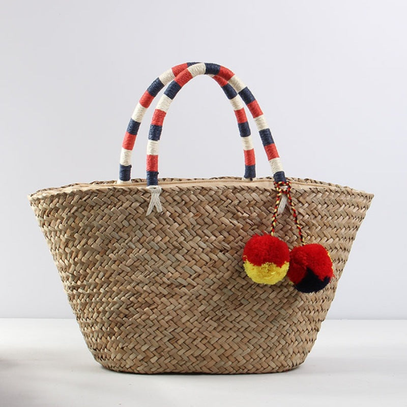 Braided beach bag with decorative pompons Bowlift