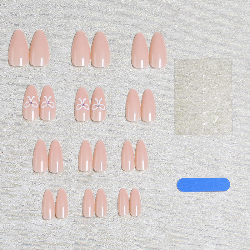 Artificia nails with delicate bow accents Bowlift