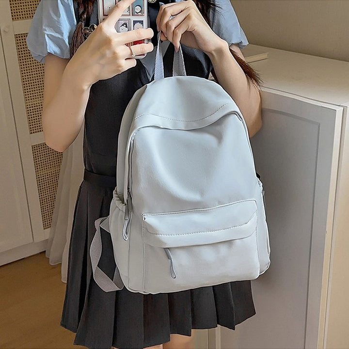 Leisure backpack with flexible side pockets and clear structure Bowlift