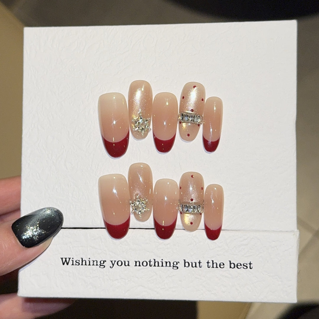 Artificial nails with festive design and rhinestone details Bowlift